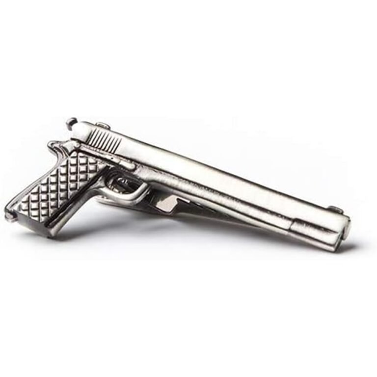 Silver-colored tie clip in the shape of a handgun, on a white background