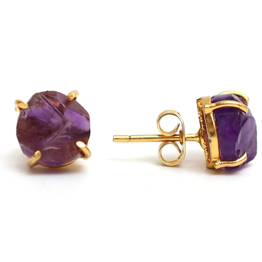 Pair of amethyst stud earrings with gold settings