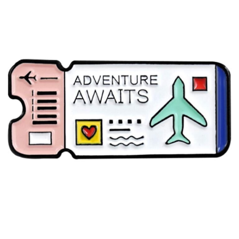 Pin of a ticket with "Adventure Awaits" and an airplane