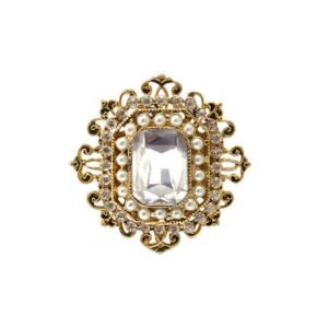 Gold brooch with a large clear gem, pearls, and small crystals