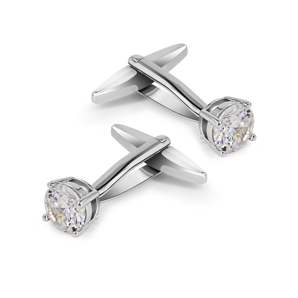 Pair of silver cufflinks with large, clear, round gemstones