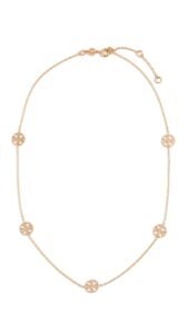 Gold necklace with five round logo pendants on a delicate chain
