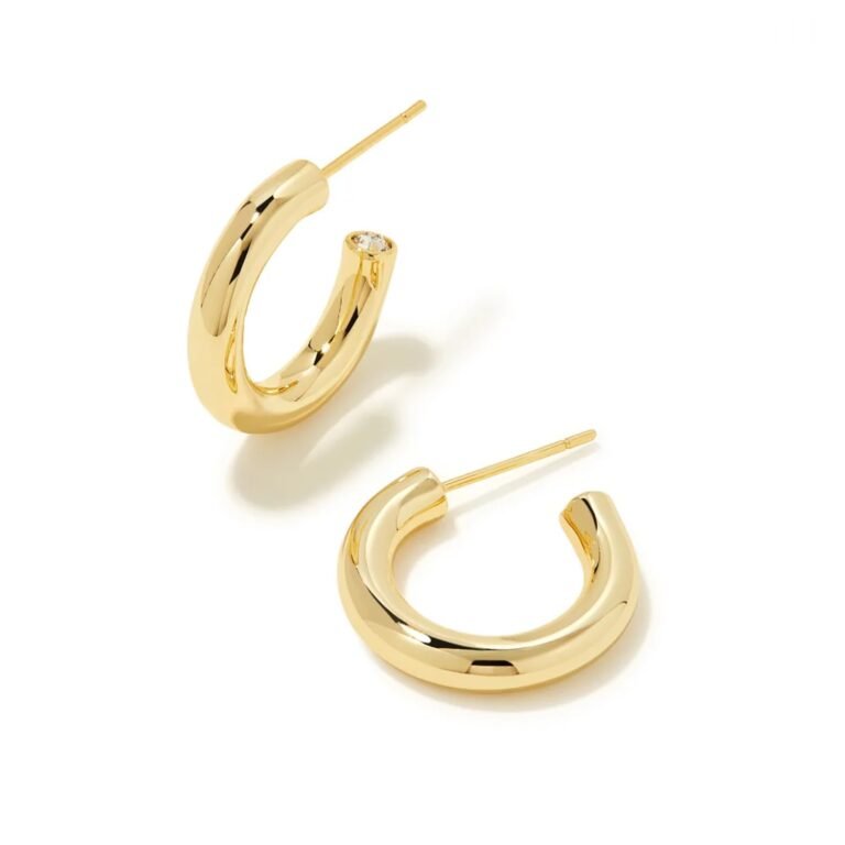Pair of gold hoop earrings, one with a small diamond accent