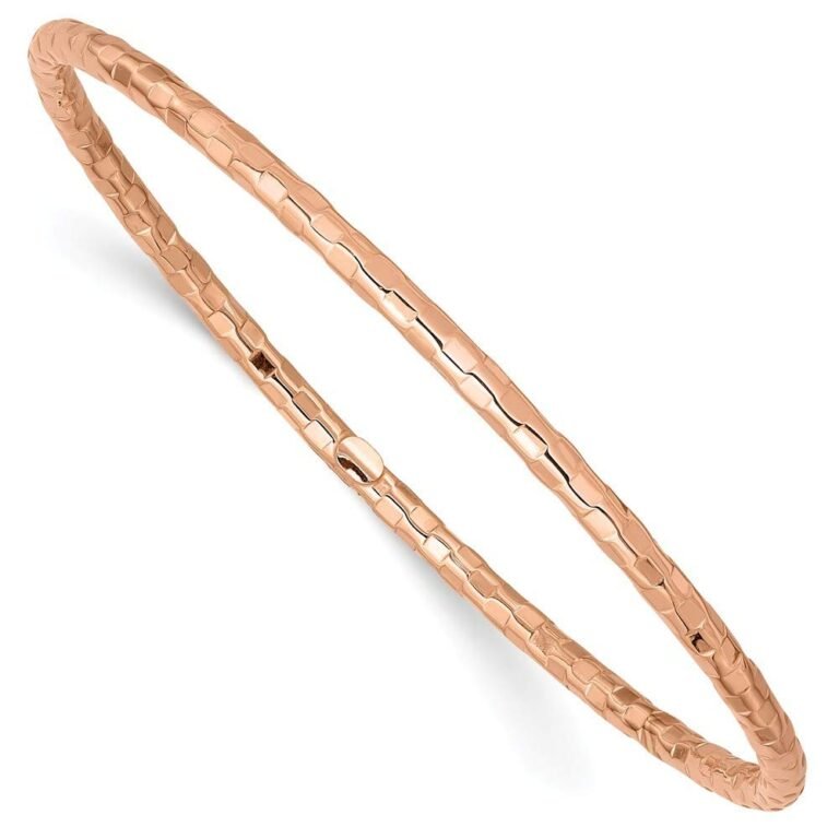 Rose gold hammered bangle bracelet on a white background
