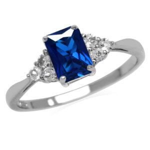 Silver ring with a large blue rectangular stone and small white stones