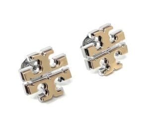 Two-tone Tory Burch logo stud earrings on a white background