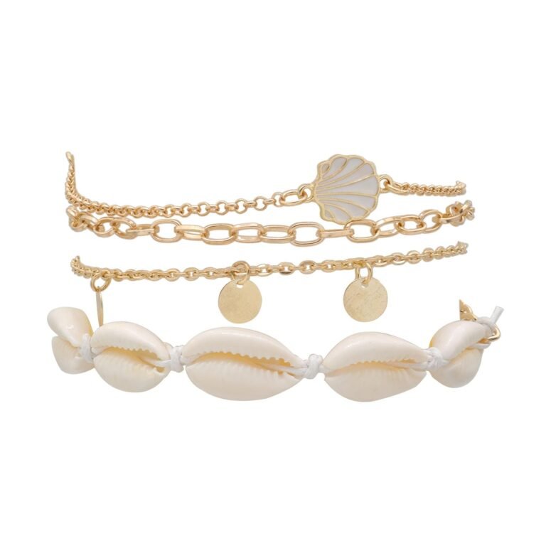 Gold chain and seashell anklet set on a white background