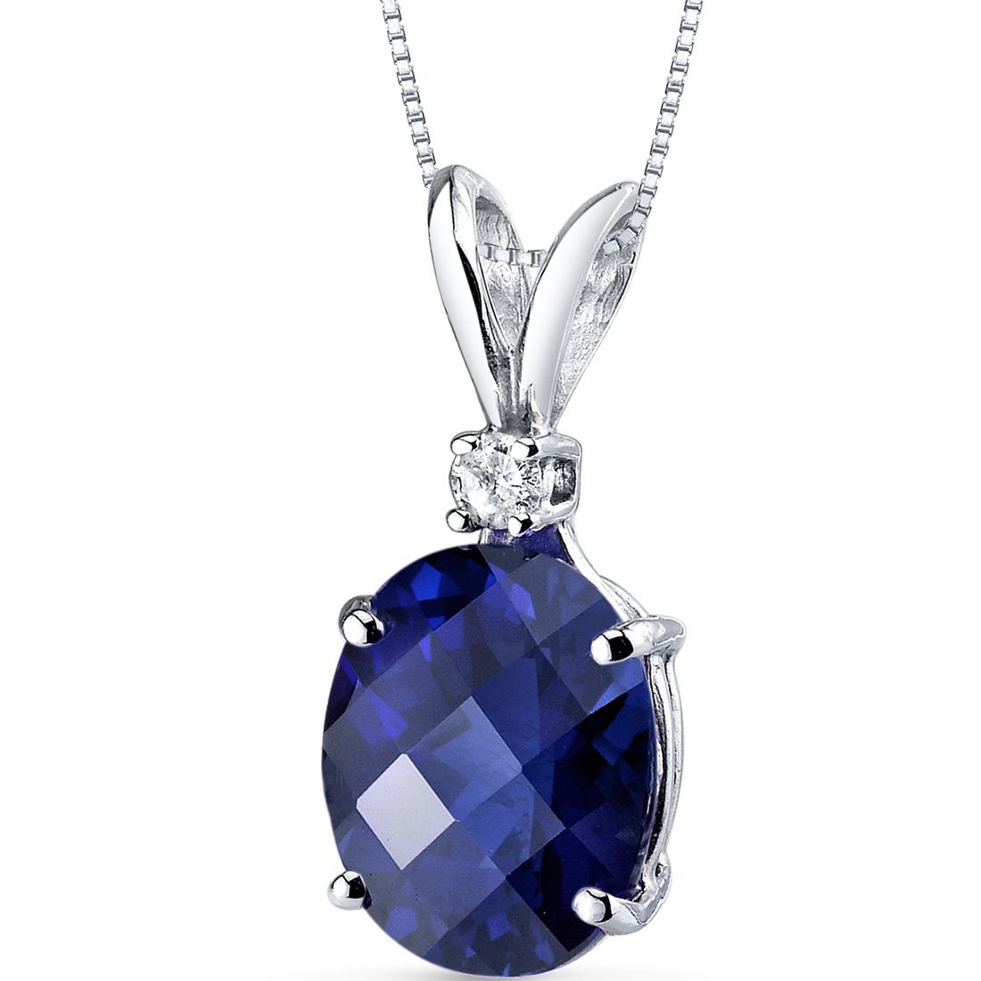 Silver pendant necklace with an oval sapphire and small diamond