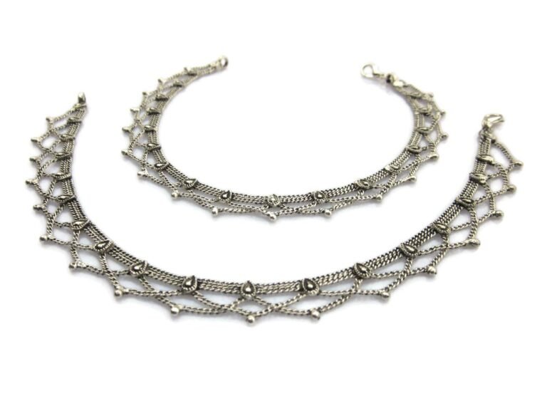 Two silver anklets with intricate, delicate chain and bead design