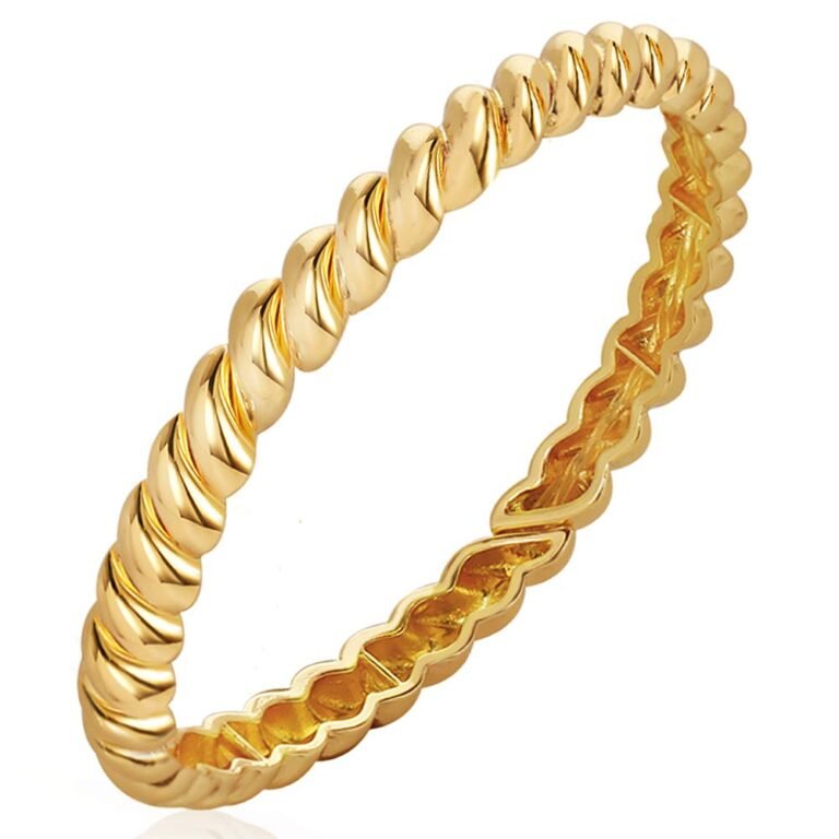 Gold twisted rope bangle bracelet on a white background