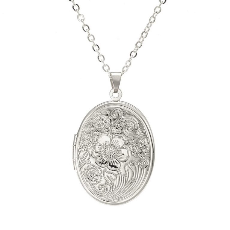 Silver oval locket necklace with floral design and chain