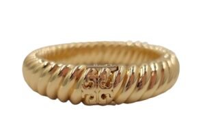 Gold-colored, ridged bracelet with a logo clasp on a white background