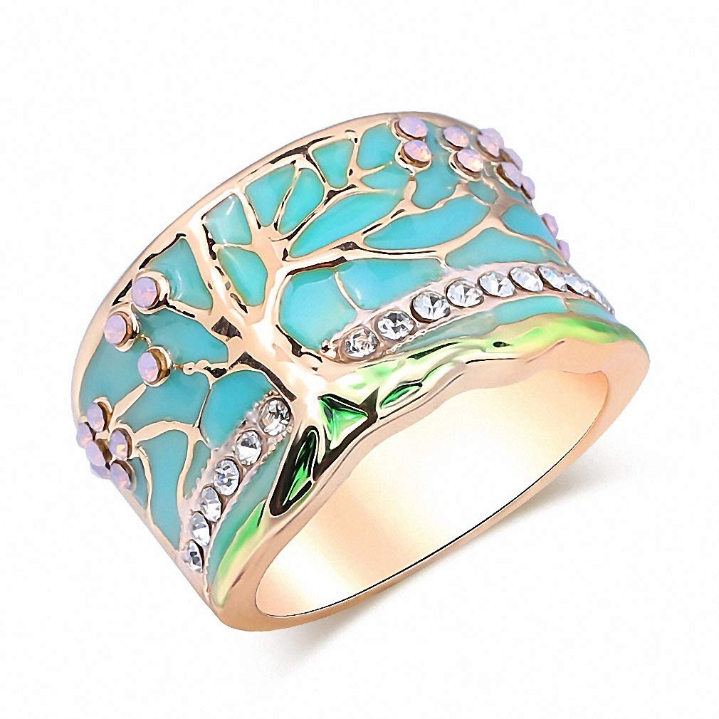 Gold ring with turquoise tree design, crystals, and pink accents