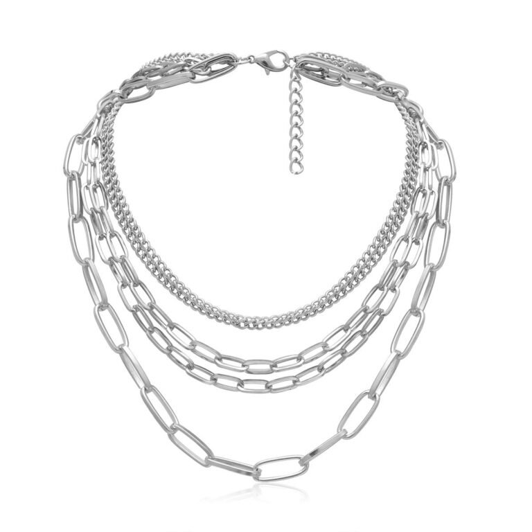 Silver multi-layered necklace with different chain styles on a white background