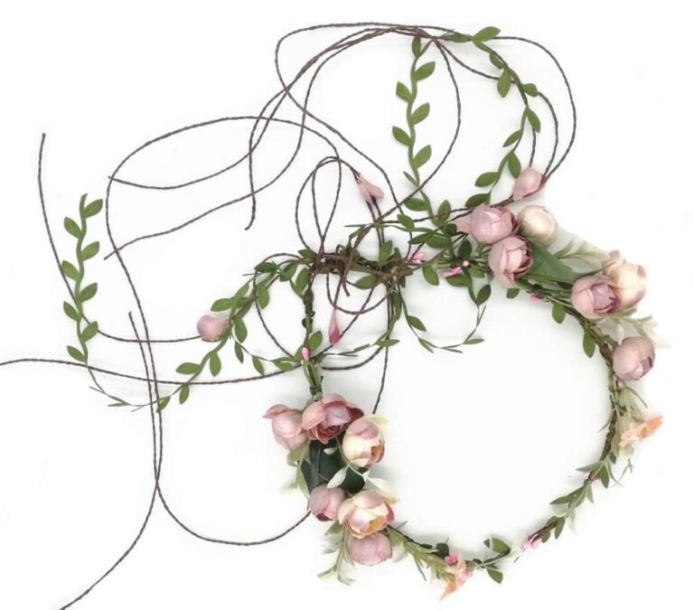 Floral crown with pink flowers, green leaves, and brown vines on white background