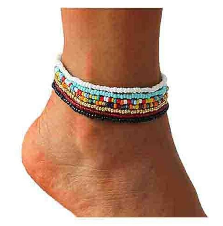 Ankle with a beaded anklet of various colors