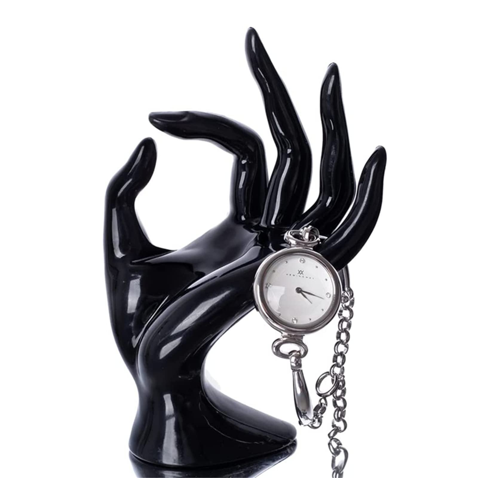 Black hand statue holding a silver pocket watch with chain