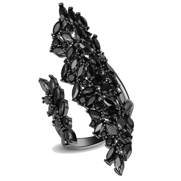 Black gemstone ring with a floral design on a white background