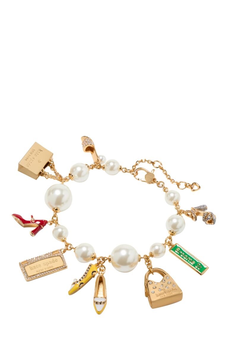 Kate Spade charm bracelet with pearls and various themed charms