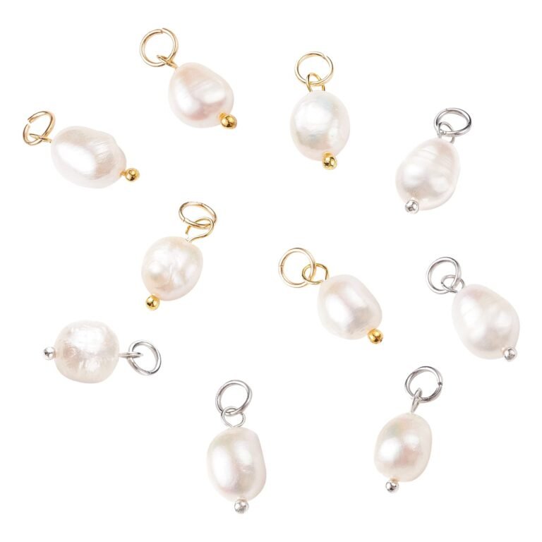 Nine pearl charms with gold and silver loops and accents