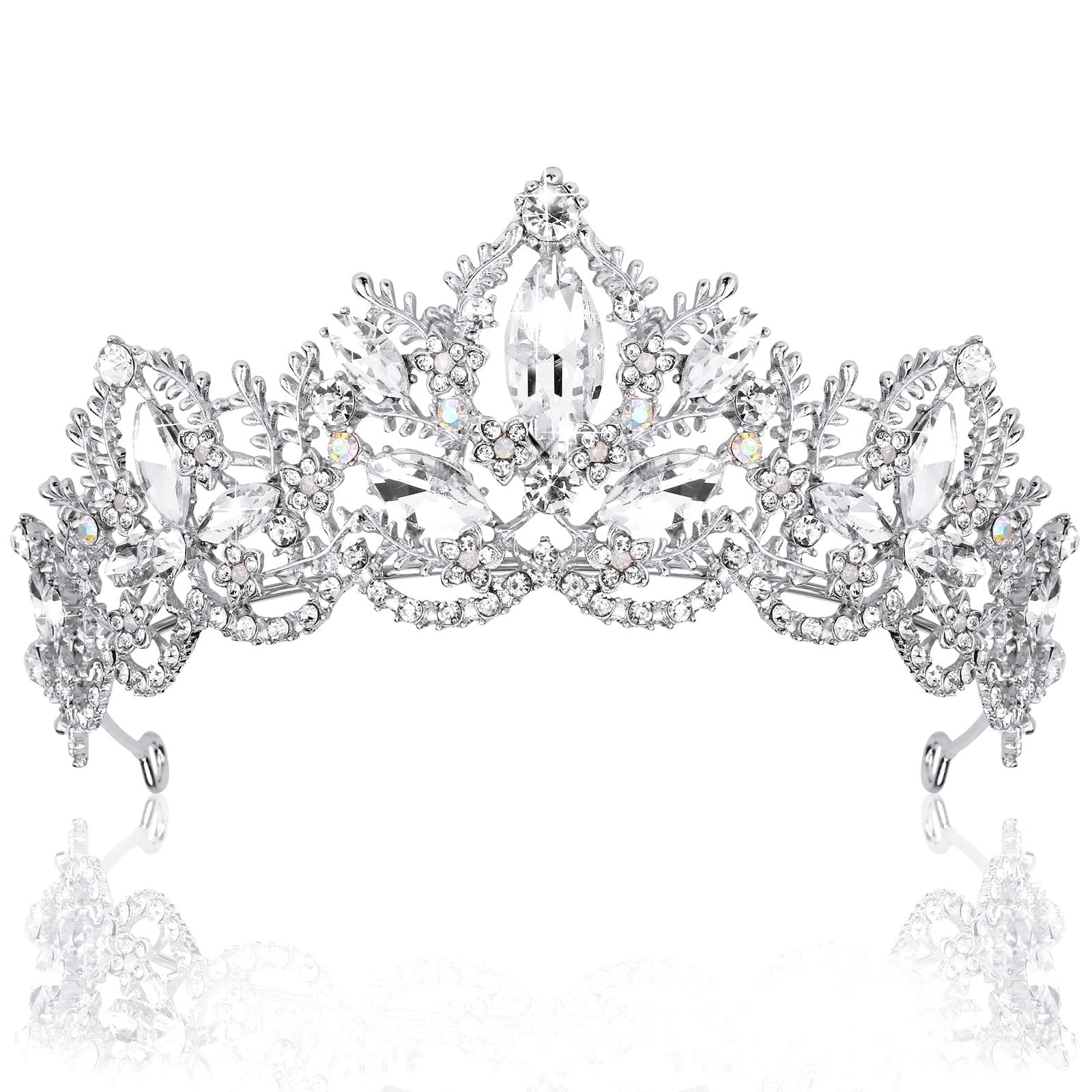 Silver tiara with clear crystals and floral details, reflecting on white surface