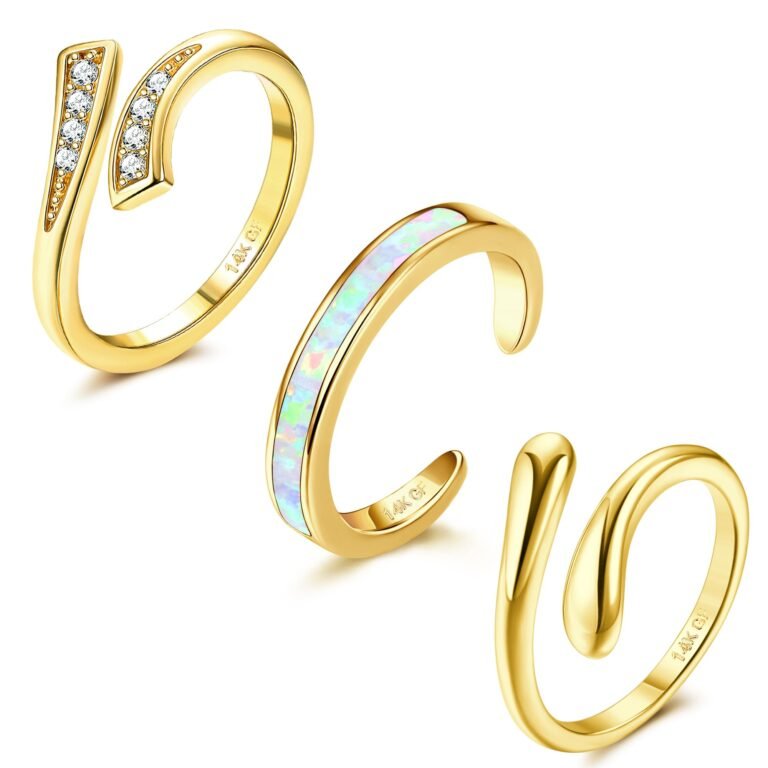 Three gold rings: one with diamonds, one with opal, and one plain