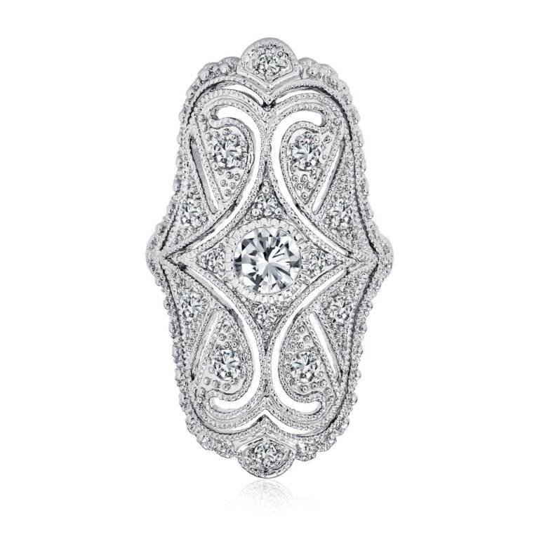 Elaborate diamond ring with filigree design and a large center stone