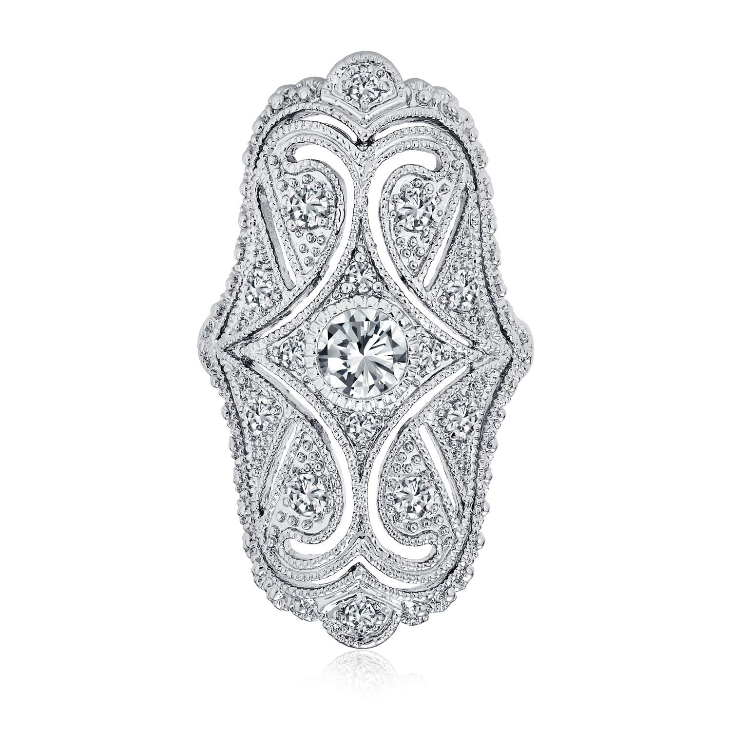 Elaborate diamond ring with filigree design and a large center stone