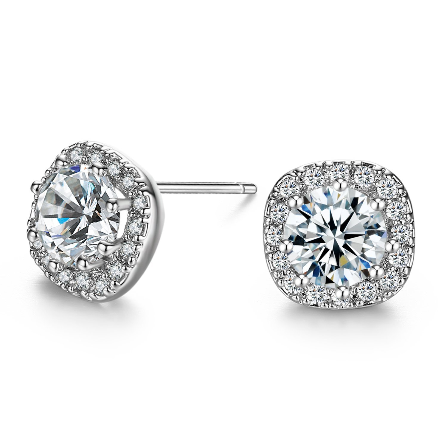 Diamond stud earrings with a halo of smaller diamonds, on white background