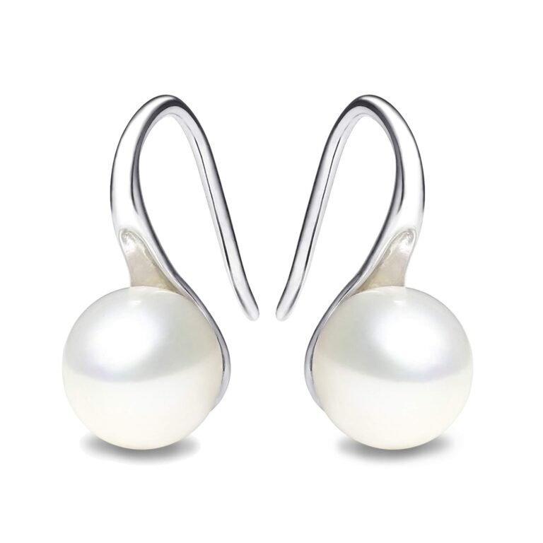 Pair of pearl drop earrings with silver hooks, isolated on white