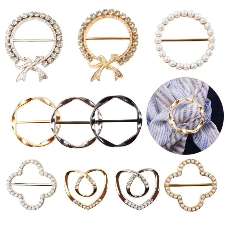 Assortment of decorative scarf rings in various shapes and embellishments