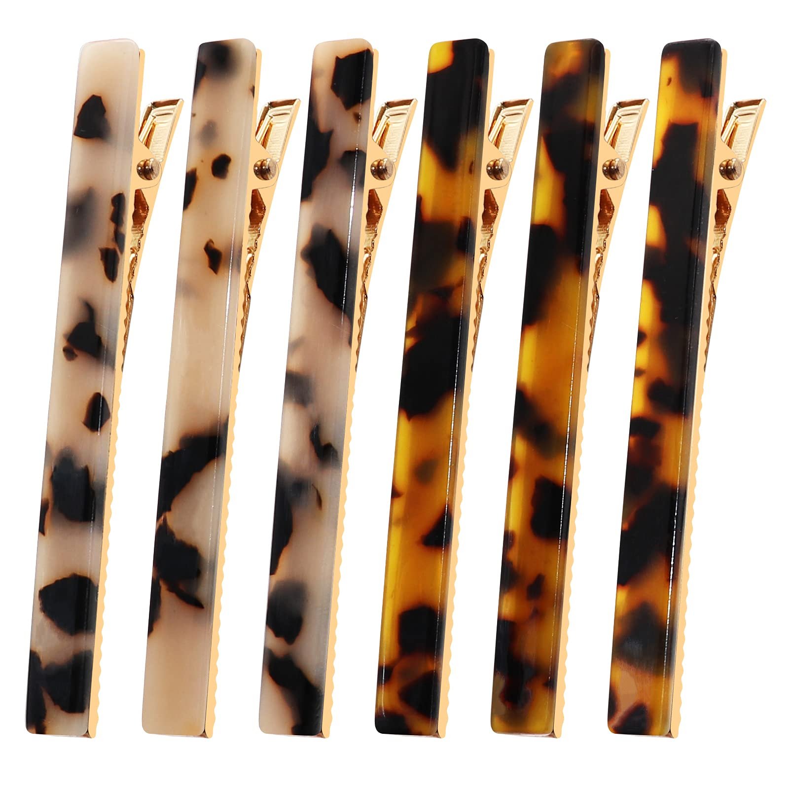 Six tortoise shell hair clips with gold-colored metal accents