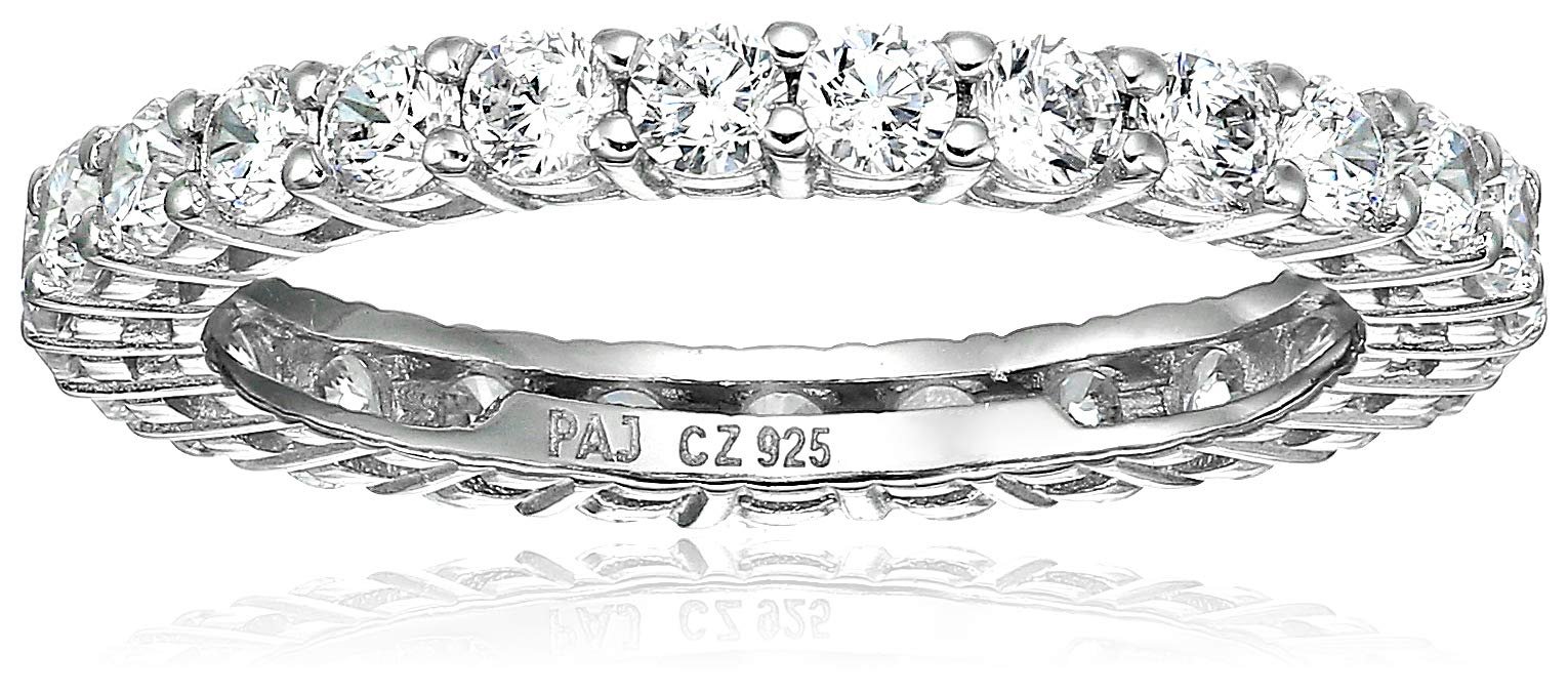 Silver ring with a band of clear, round-cut gemstones
