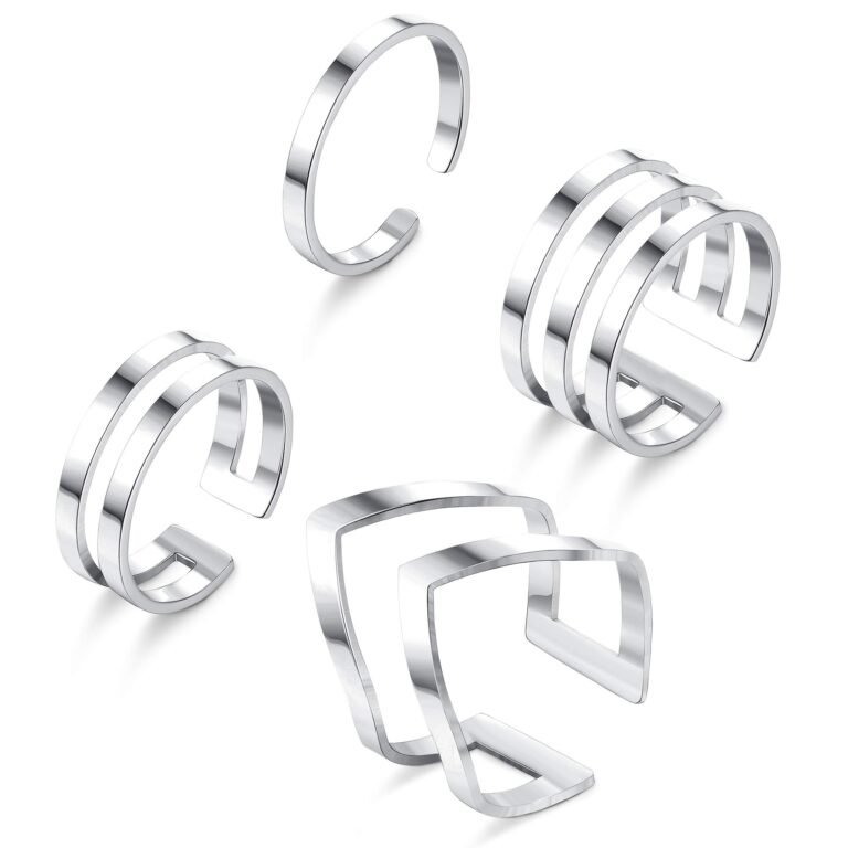 Four silver open-ended rings in different designs on a white background
