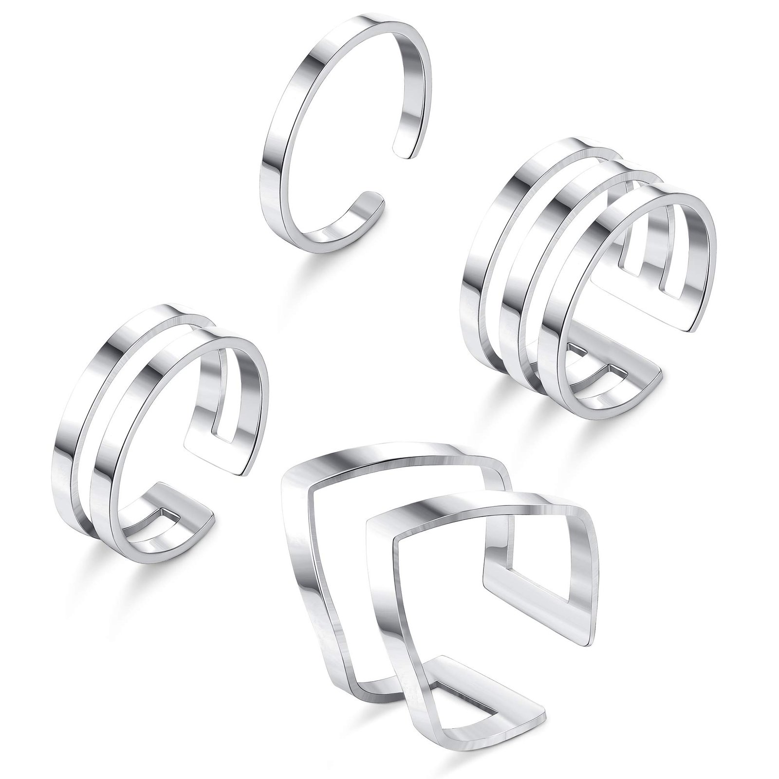 Four silver open-ended rings in different designs on a white background