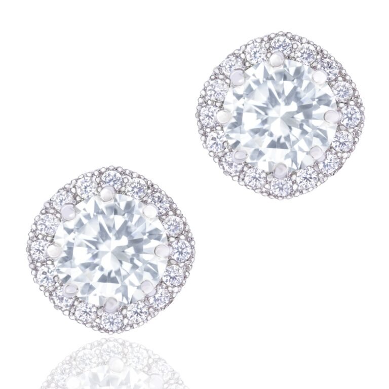 Diamond stud earrings with a halo of smaller diamonds on a white background