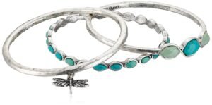 Three silver bangles with turquoise and dragonfly charm